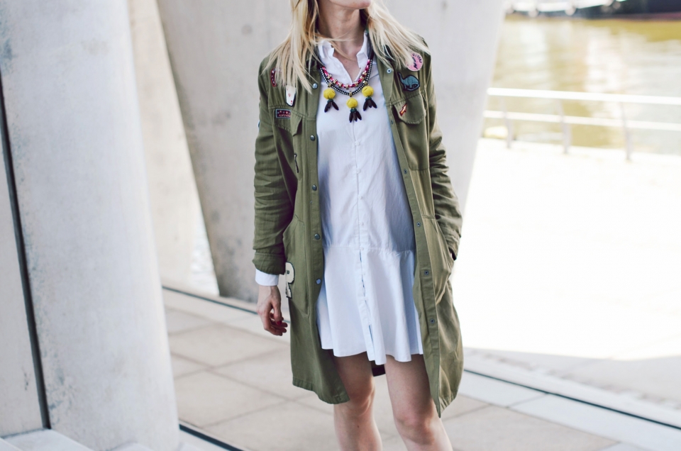 pineapple necklace, white shirt dress, parka, patches