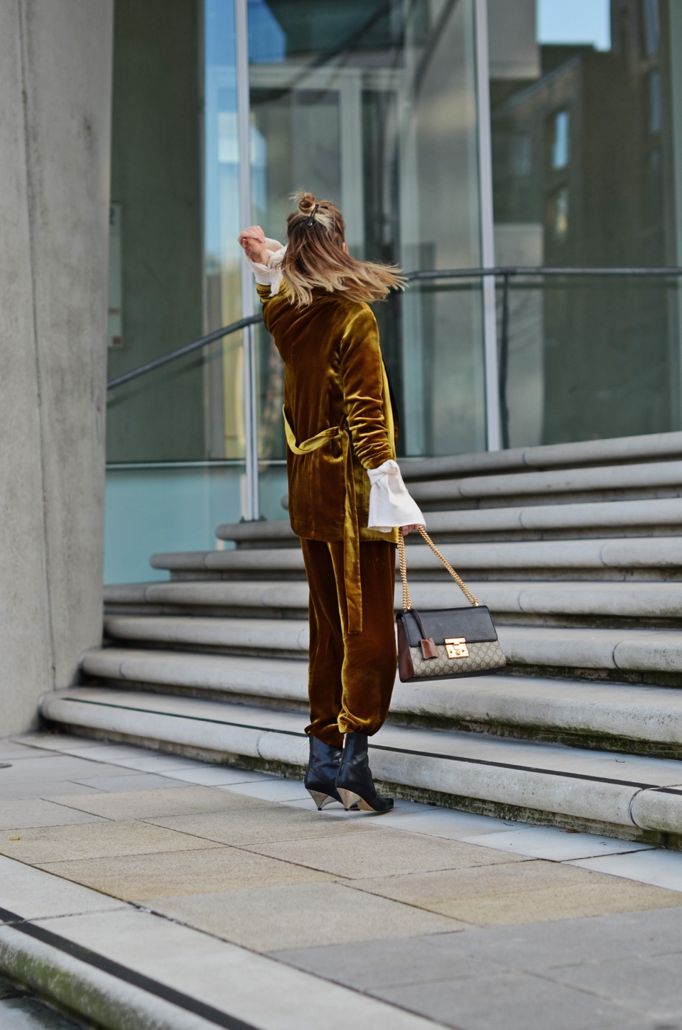 velvet suit, yellow, brown, boots, handbag