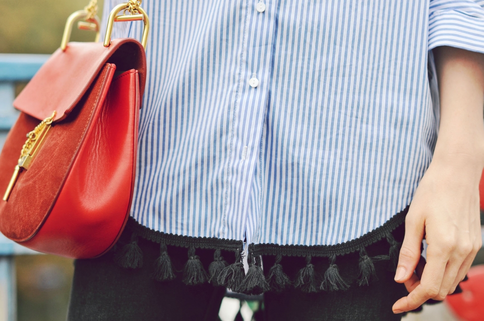 blue striped blouse, chloé handbag, black tassels