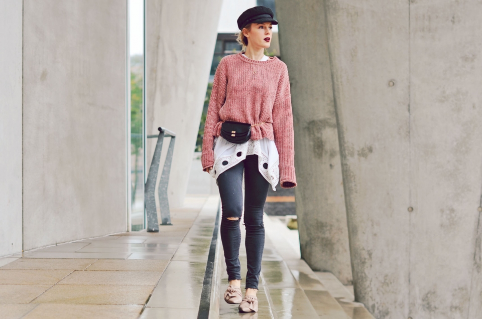beige slippers, white lace shirt, black jeans, pink sweater
